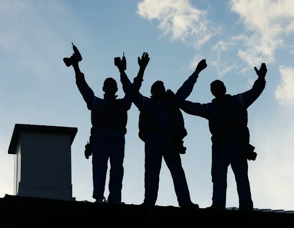 work team on the rood